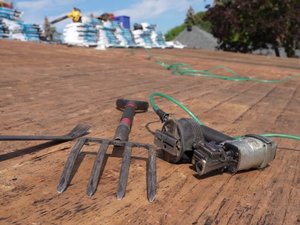 Roof shingle repair by a Green Hill roofing contractor in autumn