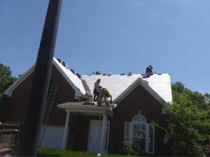 Old Hickory roofing contractors installing a durable metal roof.

