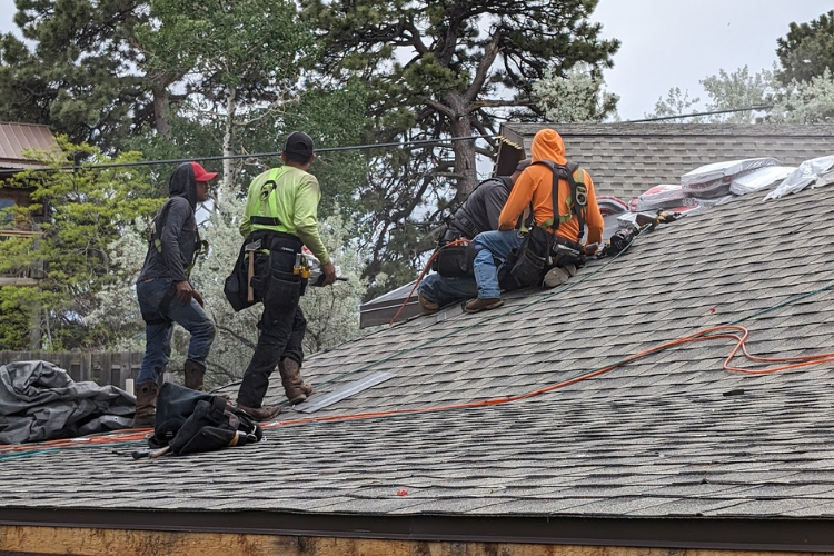T & D Construction crew installing a new roof in Green Hill